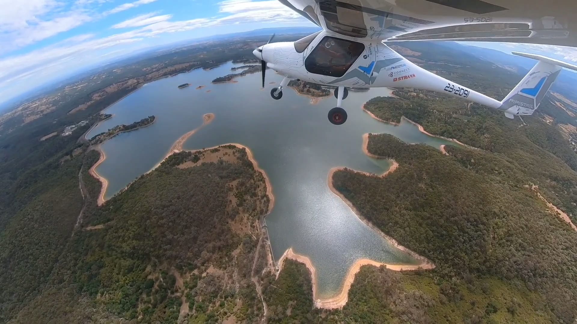Pipistrel Alpha Electro flying over Sugarloaf reservoir in Victoria