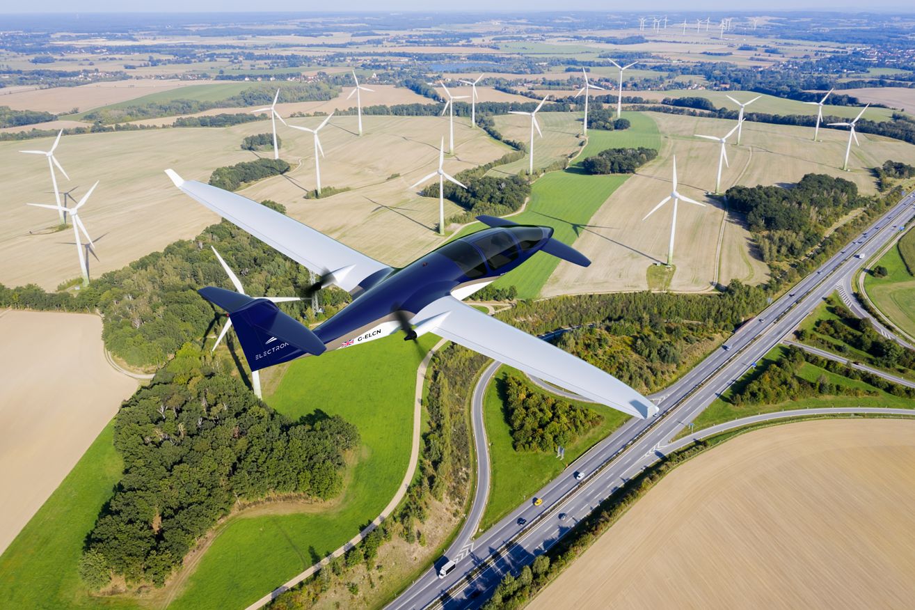 A mock-up of the Electron 5 eCTOL  Electric Aircraft flying overwindmills